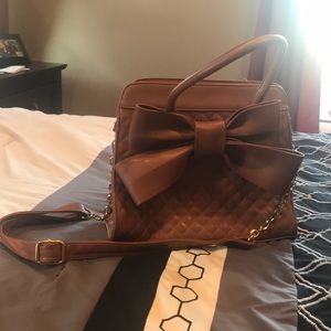 Brown purse with bow